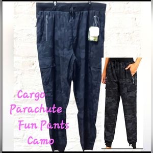 - CARGO, CAMO, AND PARACHUTE ALL IN ONE PAIR OF PANTS by Libin. NWT